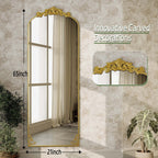 Miroir sur pied arqué à motif floral baroque