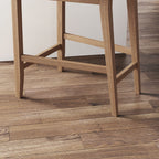Tabouret de bar moderne Gracie, chaise rembourrée en tissu bouclé et pieds en bois brossé