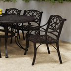 Sanibel Bronze Aluminum 7- Piece Outdoor Dining Set with 72 Oval Dining Table and Six Armchairs by Homestyles